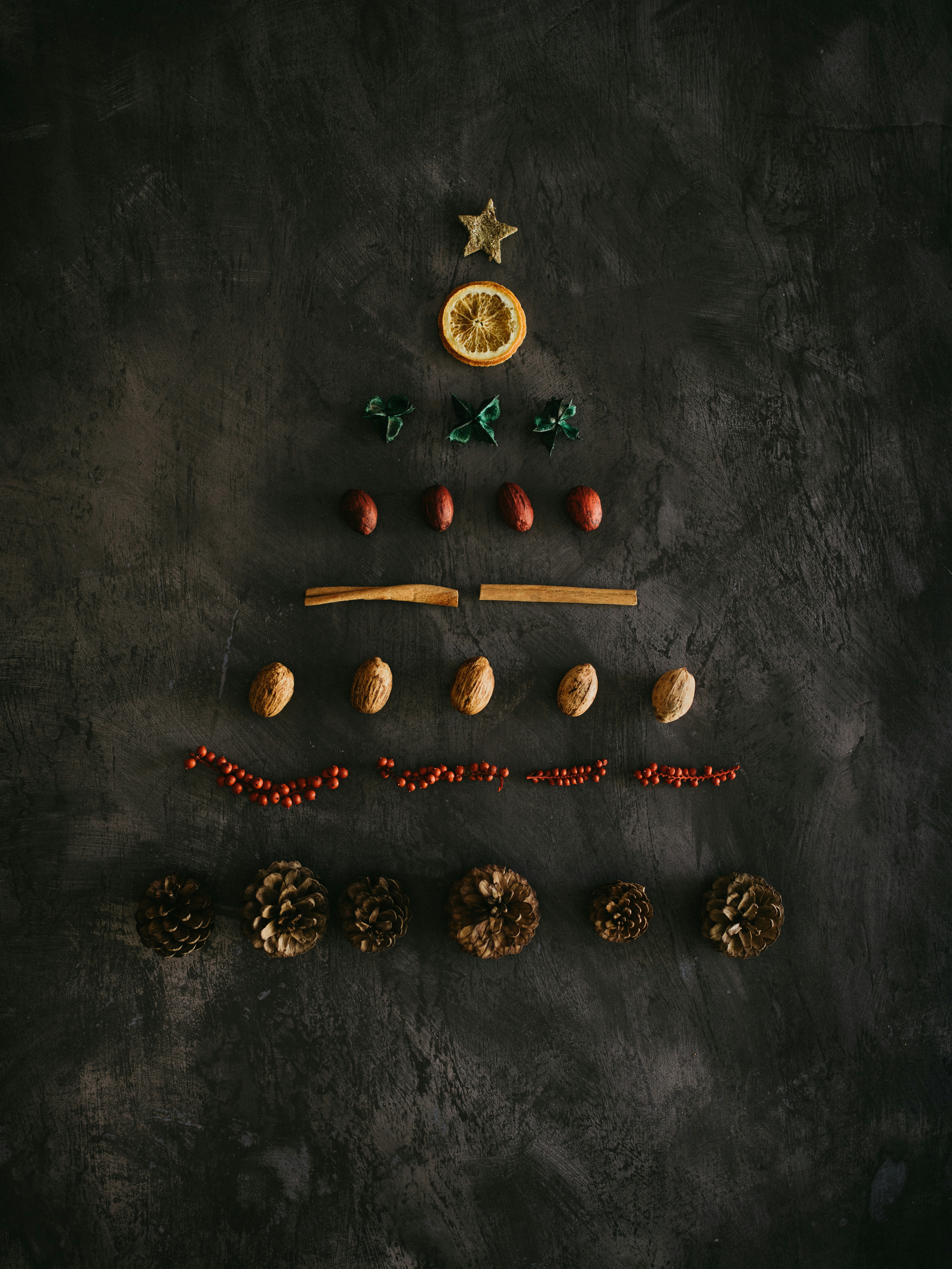 Various Christmas elements are assembled into a Christmas tree - wallpaper image