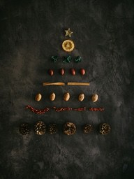 Various Christmas elements are assembled into a Christmas tree - wallpaper image