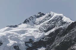 Snow-capped mountain peak, majestic mountains, spectacular scenery. - free wallpaper image